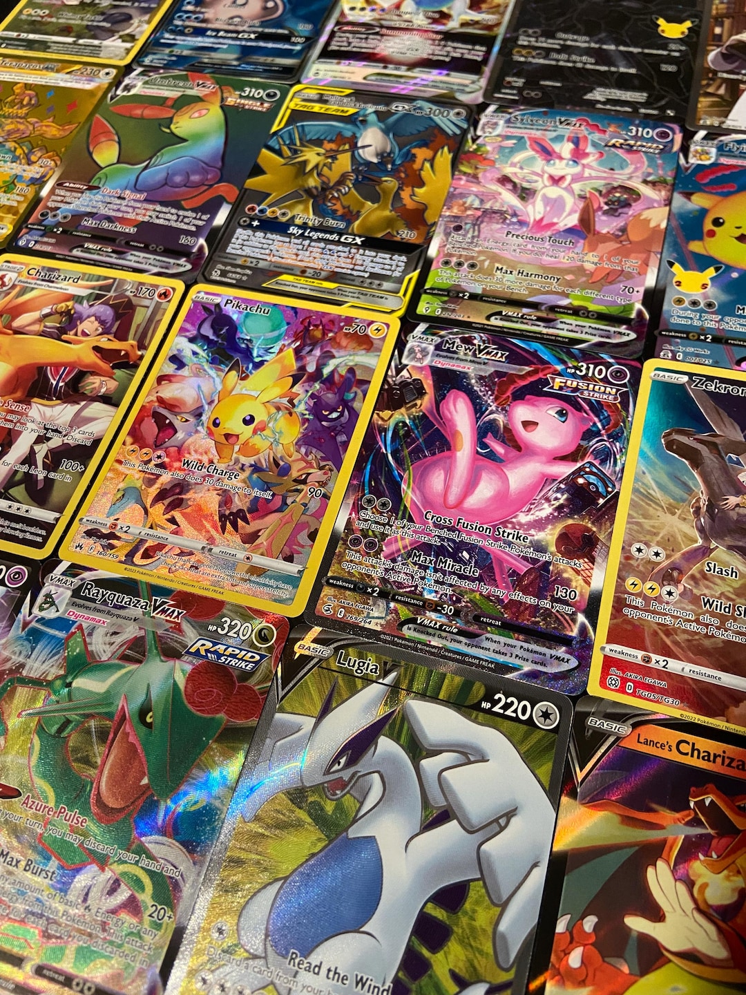 50 rare pokemon cards 50+ Official Collection with 5 Foils in Any Combination and at Least 1 Rarity, GX, EX, FA, Tag Team, Or Secret : Toys & Games Each box comes with 50+ Pokemon cards and is GUARANTEED to come with 1 Ultra Rare and 5 Holo cards Pokemon Cards 50 Card Assorted