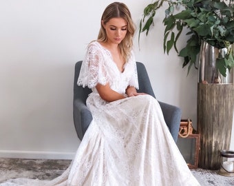 Romantic Lace Wedding Dress with Short Flare Bell Sleeves, Low Back Boho Bridal Gown with long train