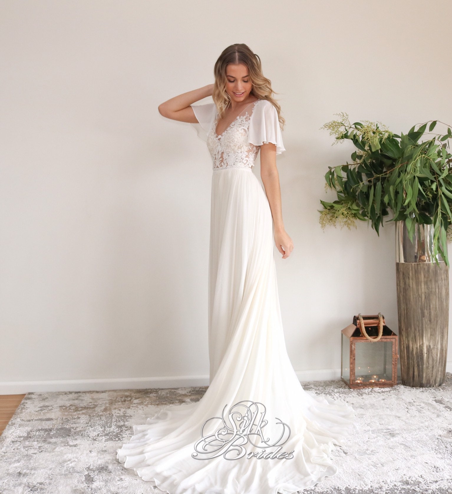 pleated tulle flutter back sheath wedding dress 66128: Pleated English Net A-Line with Tiered Flutter Sleeves and Hem