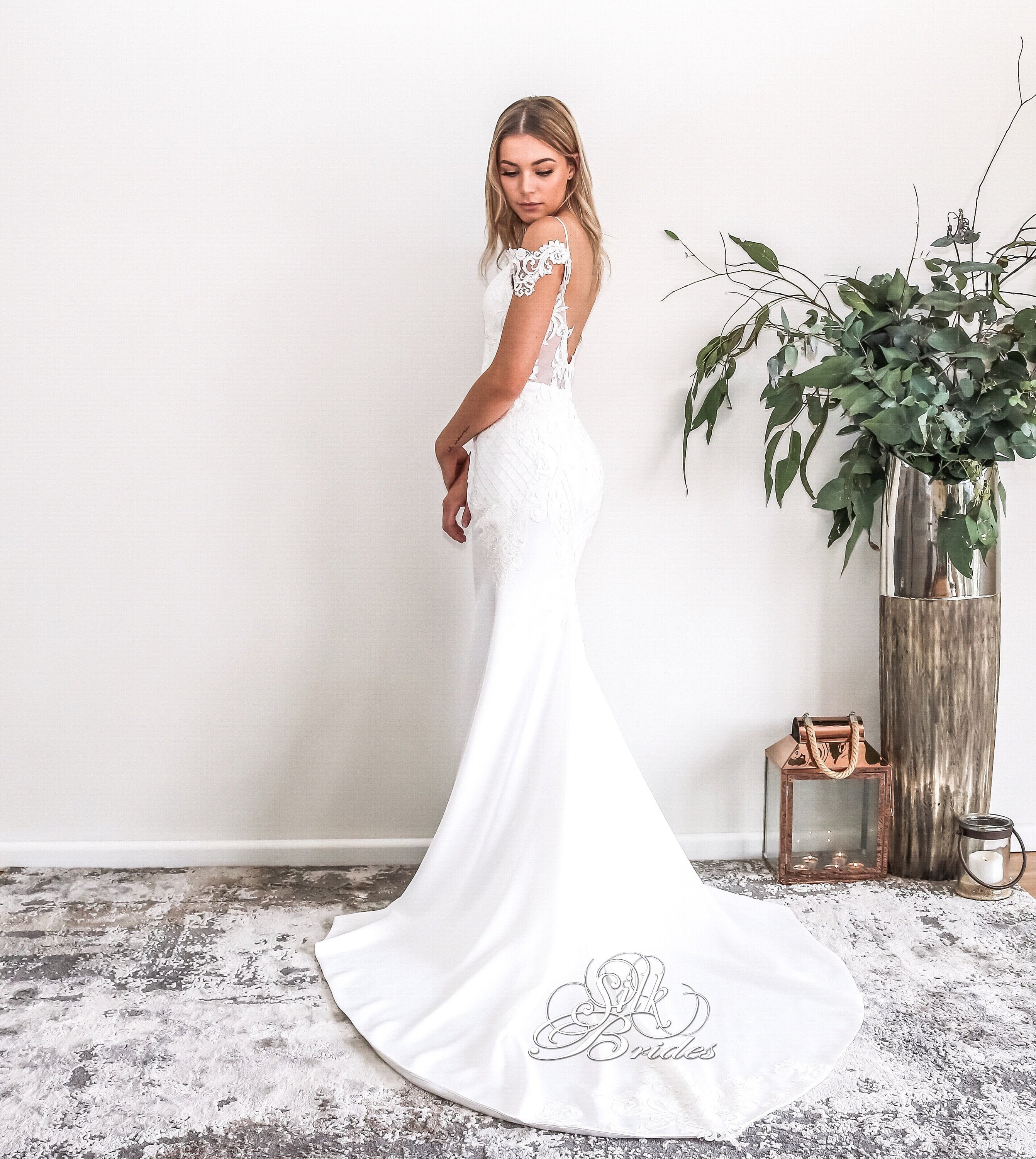 off the shoulder illusion wedding dress