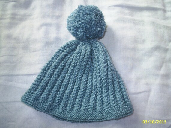 blue bobble hat