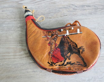 Vintage leather water pouch with bull fighter imagery