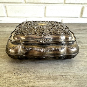 Vintage silver-plate jewelry casket with red velvet liner, ornate silver keepsake box, vintage jewelry storage