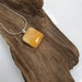 Carol Barber reviewed A little bit of orange. Lovely swirled pendant
