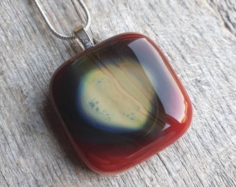 Amazing unique reactions in red and silver leaf glass pendant, stunning silver reactions of the heart glass  necklace.