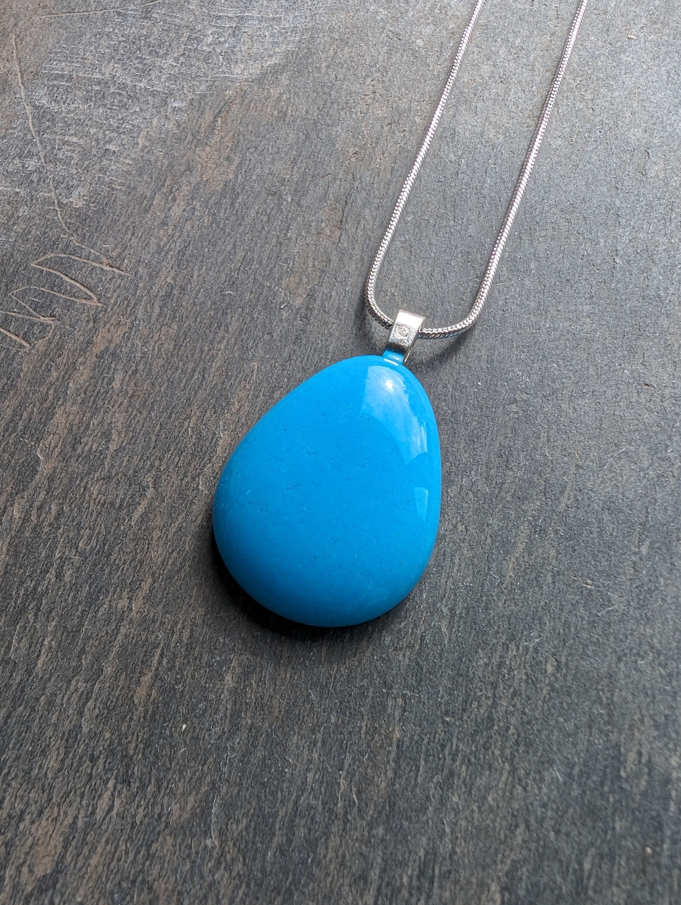 Light Blue Teardrop Pendant Necklace: Glow in the Dark Glass