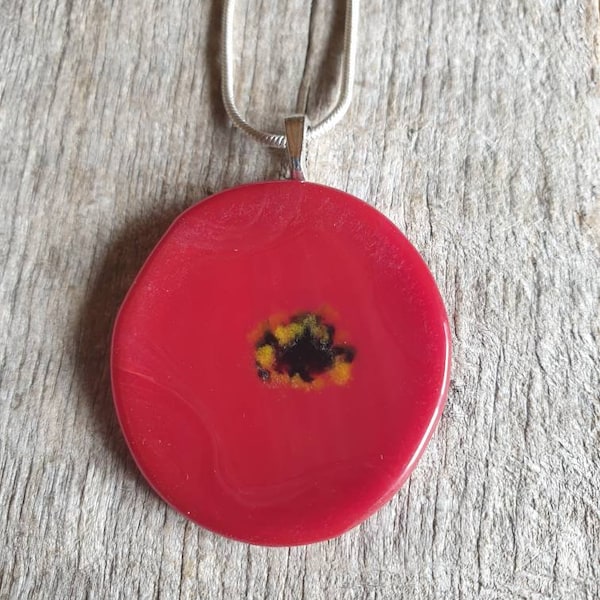 Beautiful fused glass poppy necklaces. Lovely poppy inspired compressed glass pendants.