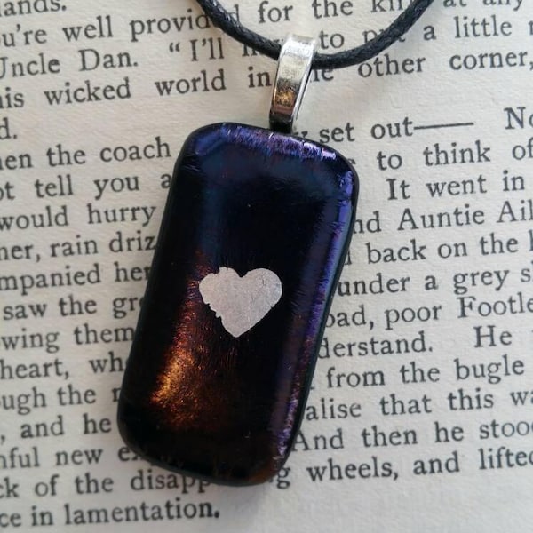 A unique black, blue and pebble effect fused glass necklace. Lovely compressed art glass pendant.