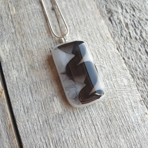 Amazing grey and black swirls in this handcrafted fused glass pendant, stunning streaky grey glass necklace. Stunning monotone jewellery.