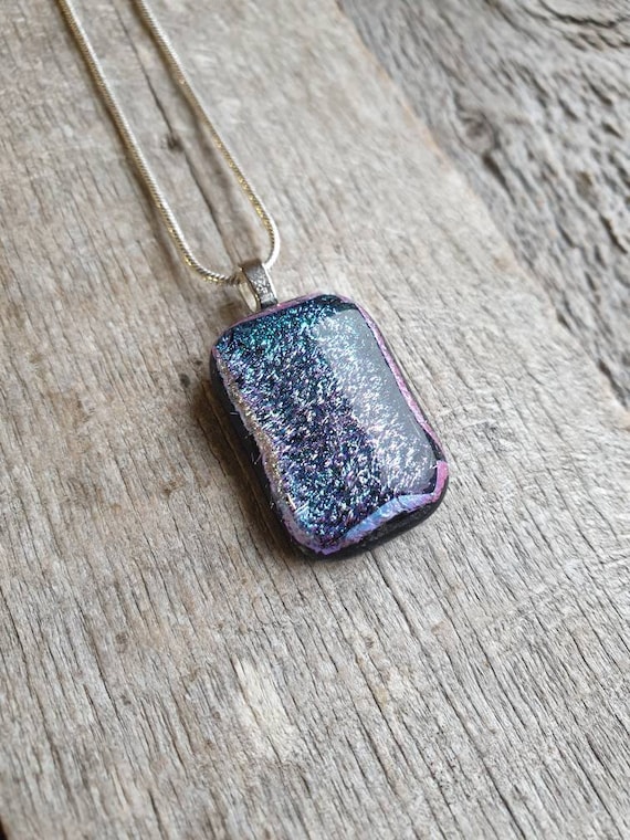 Lovely Sparkle of Blues and Purples in This Black Glass Pendant