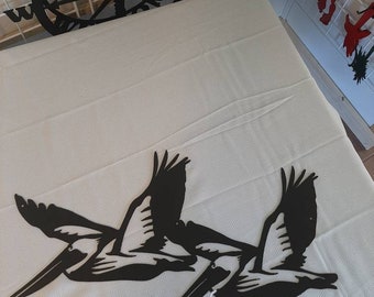 Flying Pelicans metal wall art