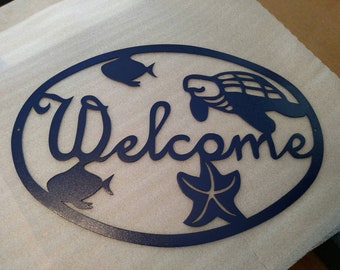 Ocean scene welcome sign