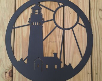 Lighthouse with sun metal wall art
