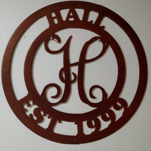 Monogram, established date, name sign