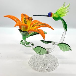 Glass Hummingbird with tigerlilly or orchid