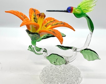 Colibri en verre avec tigerlilly ou orchidée