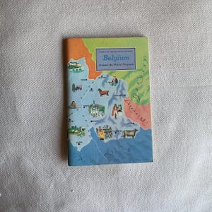 Vintage programmaboek Travel Around The World uit de jaren 60 - België