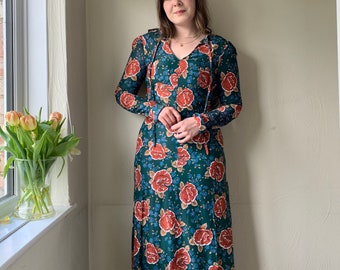 Vintage maxiklänning med blommigt tryck från 1970-talet