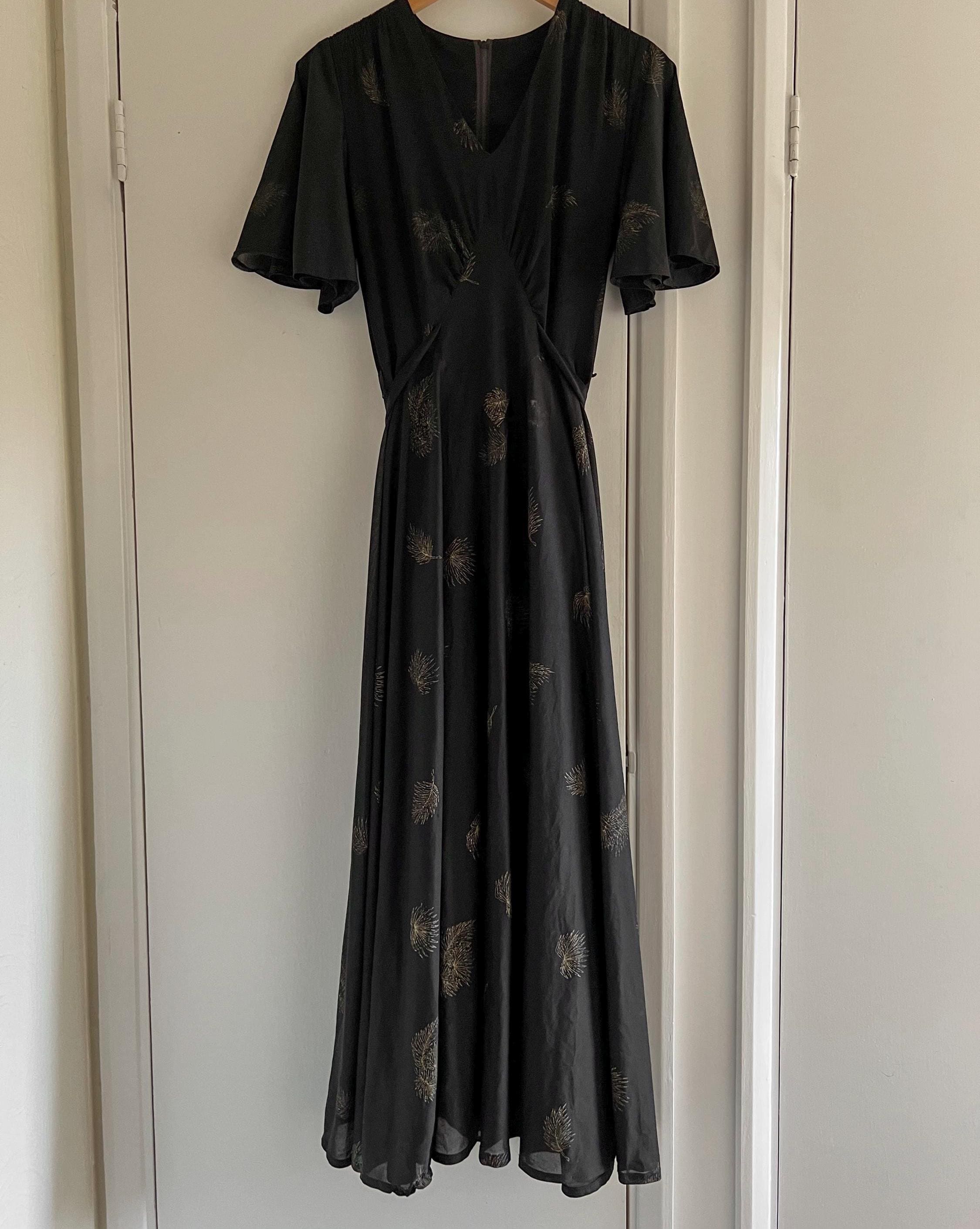 black dress with corset top Sarifa Black Velvet Strapless Corset Midi Dress With Ruffle Peplum – Club L  London