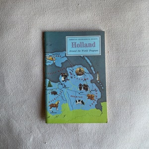 Vintage reisboek uit de jaren 60 - Holland Around the World-programma