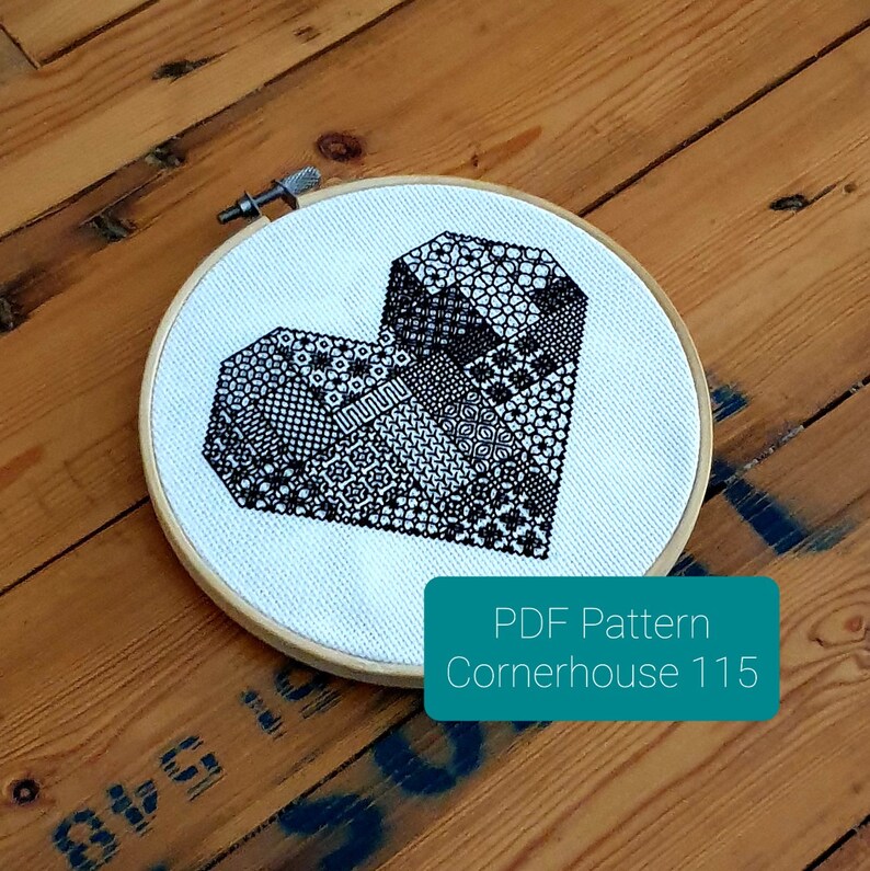 May include: A black and white cross-stitch pattern of a geometric heart in a wooden embroidery hoop. The pattern is titled "Cornerhouse 115" and is available as a PDF download.