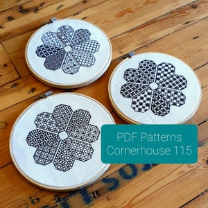 Può includere: Tre cerchi da ricamo con tessuto bianco e ricami neri. I disegni sono geometrici e floreali. Il testo "PDF Patterns Cornerhouse 115" è visibile sotto i cerchi.