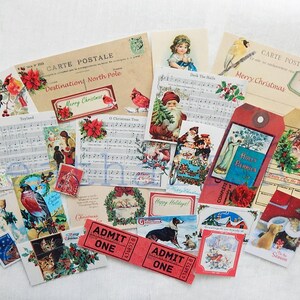 May include: A collection of vintage Christmas themed paper ephemera, including postcards, sheet music, and gift tags. The ephemera features images of Santa Claus, holly, robins, and other festive motifs. The text on the ephemera includes "Merry Christmas", "North Pole", and "Deck the Halls".