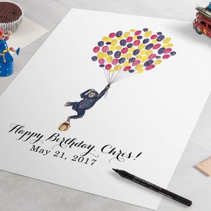 May include: A white card with a monkey holding a gift box and flying with a bunch of colorful balloons. The balloons are made of finger prints. The card says "Happy Birthday Chris! May 21, 2017"