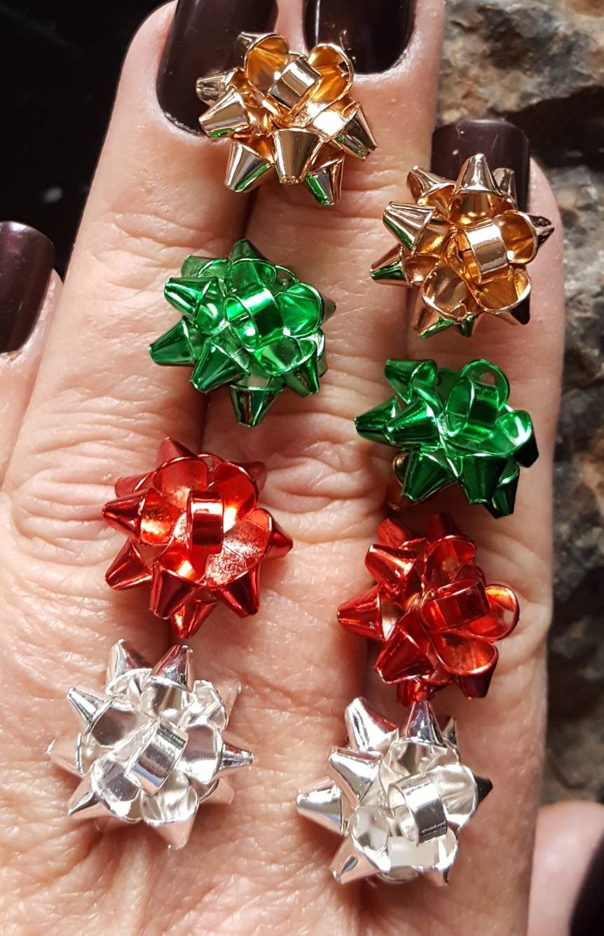 Present bow earrings best sale