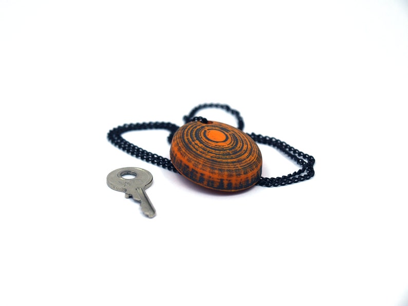 Oval Pendant with Secret Key Storage image 3