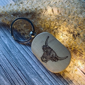 Wood burned highland cow keychain