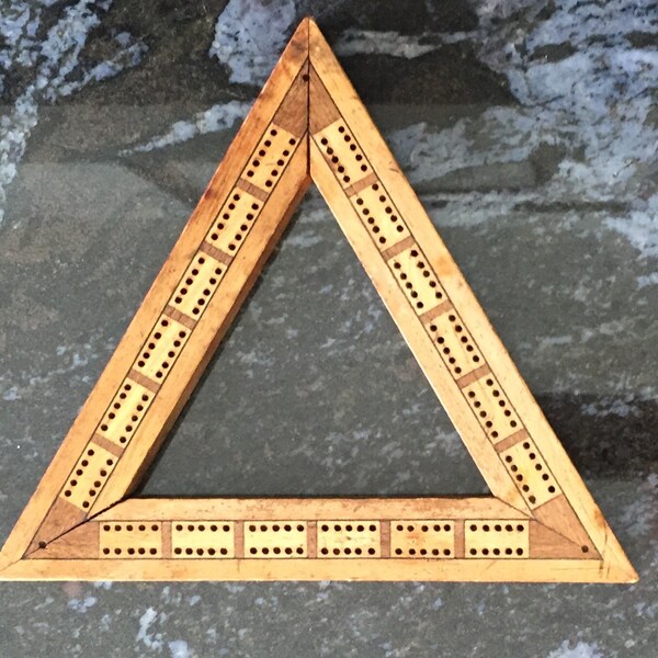 Tablero de cribbage antiguo