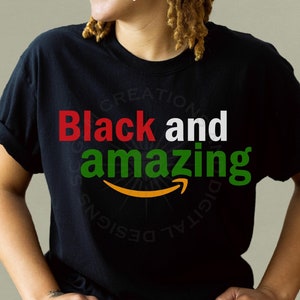 May include: Black t-shirt with the text "Black and amazing" in red, white, and green letters. The text is stylized to look like the Amazon logo.