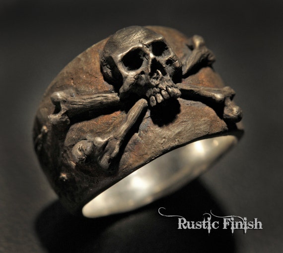 Skull and crossbones ring deals