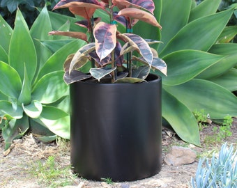 Brea Round Cylinder Planter - Black. Made from hand laid fiberglass. For Indoor and outdoor garden use. Various sizes available.