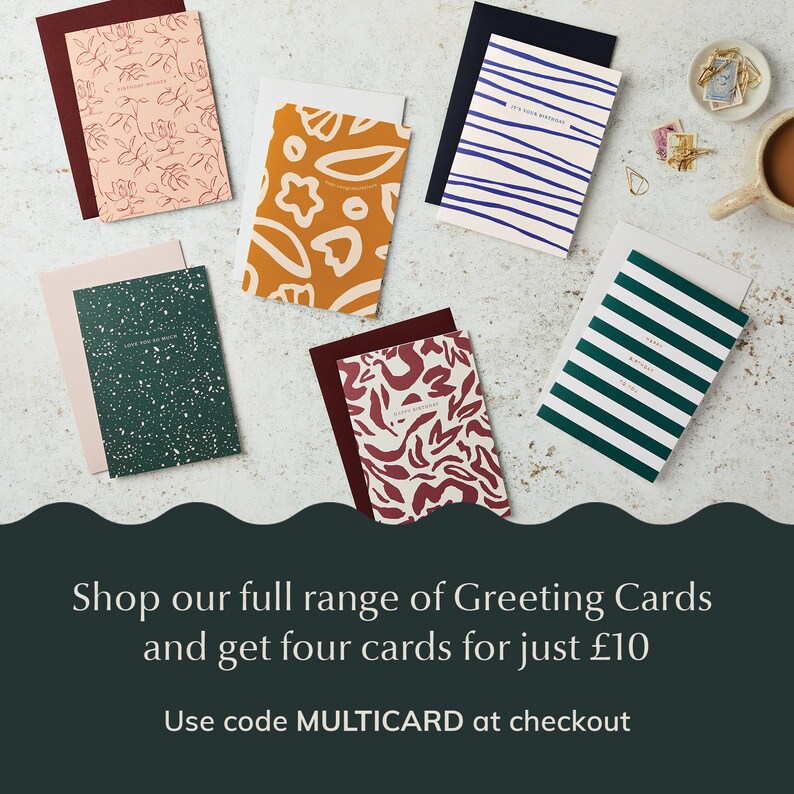 May include: Assortment of greeting cards with various colorful abstract designs. The cards are arranged on a white surface. The text on the cards reads "Happy Birthday", "It's Your Birthday", "Love You So Much", and "Happy Birthday". The text at the bottom of the image reads "Shop our full range of Greeting Cards and get four cards for just &pound;10. Use code MULTICARD at checkout."