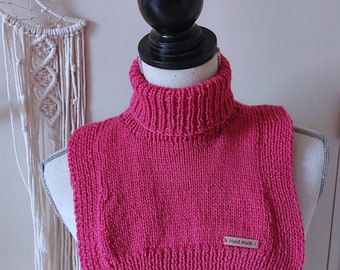 Hand-knitted bib neck warmer in super soft organic wool yarn, fuschia pink color