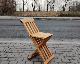 Simple medieval folding wooden chair, scissor chair, italian chair