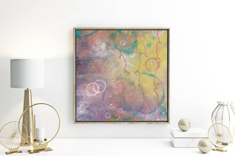 May include: Abstract painting with a yellow, brown, and purple background. The painting features pink and white circles and red lines.