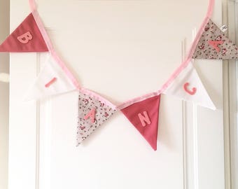 personalized fabric bunting banner baby girl, in pink and white pattern with pink felt name  to decorate your baby shower