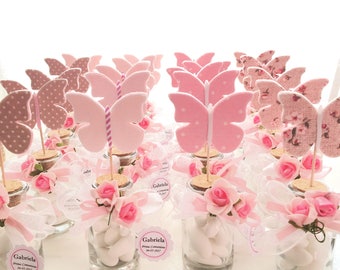 personalized favor for girl’s communion, jar with stopper and felt and fabric butterfly, assorted colors in pink and white and beige shades