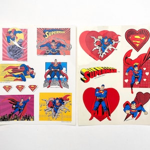 May include: A sheet of Superman Valentine's Day stickers featuring red hearts, Superman flying, and the Superman logo.
