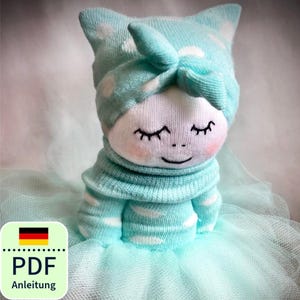 Sockenpuppe Nähanleitung DIY Tutorial süße Puppe mit Tutu Schritt für Schritt Bastelprojekt Anfänger PDF Deutsch