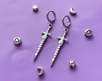 Crescent Blade Silver Sword Earrings | Silver Huggie Hoops, Alternative Jewellery, Sword Jewellery, Fantasy Earrings, Goth Warrior Earrings