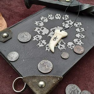 Assamite/Banu Haqim faux fang pendant