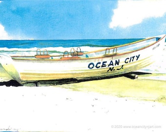 May include: A white lifeguard boat with "Ocean City N.J." painted on the side, sitting on a sandy beach with blue water and a cloudy sky in the background.