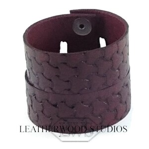 Leather handcuffs bracelet with dragon scale tooled pattern