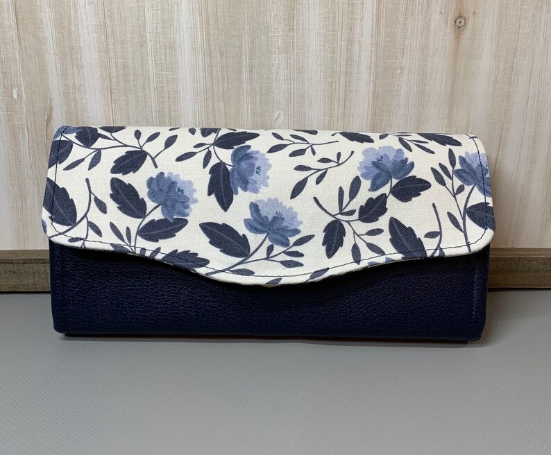 Necessary clutch wallet