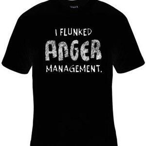 May include: Black t-shirt with white text that reads "I flunked anger management."