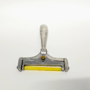 Vintage Aluminum Adjustable Cheese Slicer with brass knob made in Taiwan